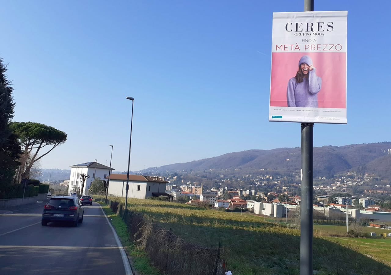 Pubblicità su strada per saldi settore abbigliamento brand Ceres